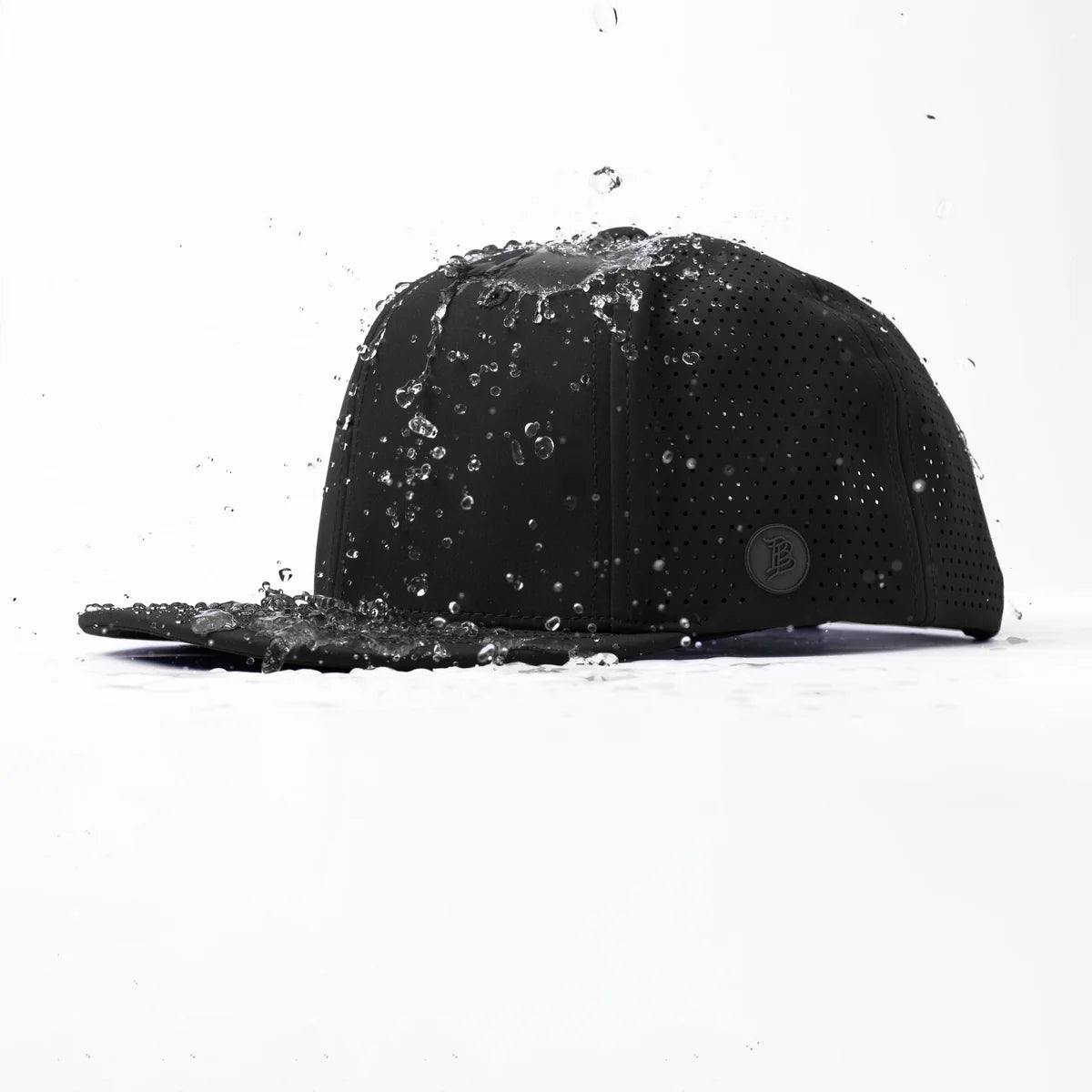 GolferBro black performance cap with water-resistant perforated fabric and side patch detail