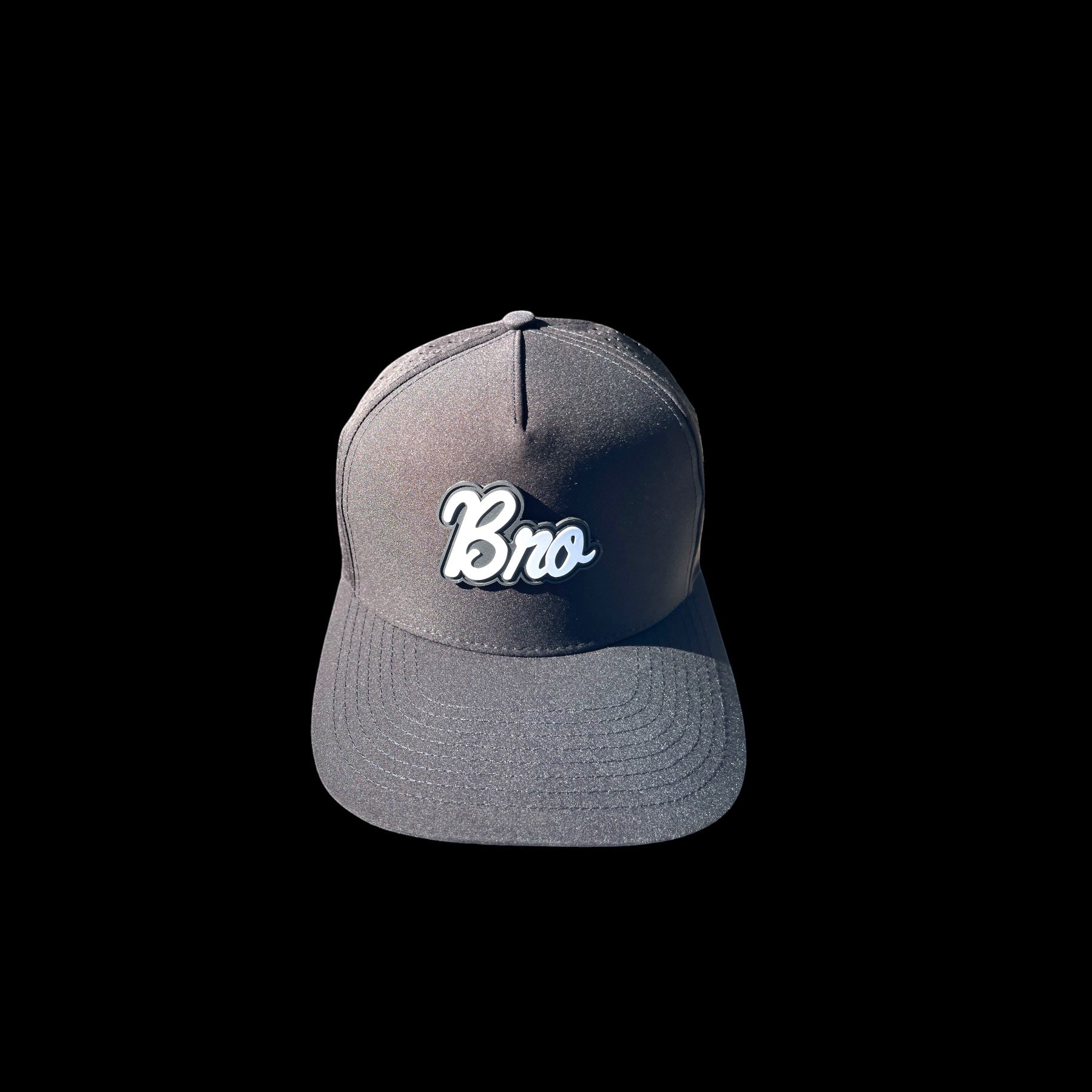 GolferBro dark grey polyester-spandex snapback cap with 'Bro' logo and perforated side panels.