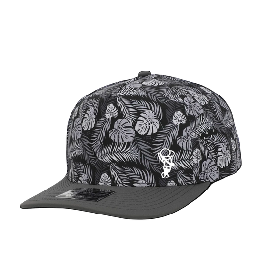 GolferBro performance snapback cap in black and grey with a tropical leaf pattern and a white PVC logo on the front.